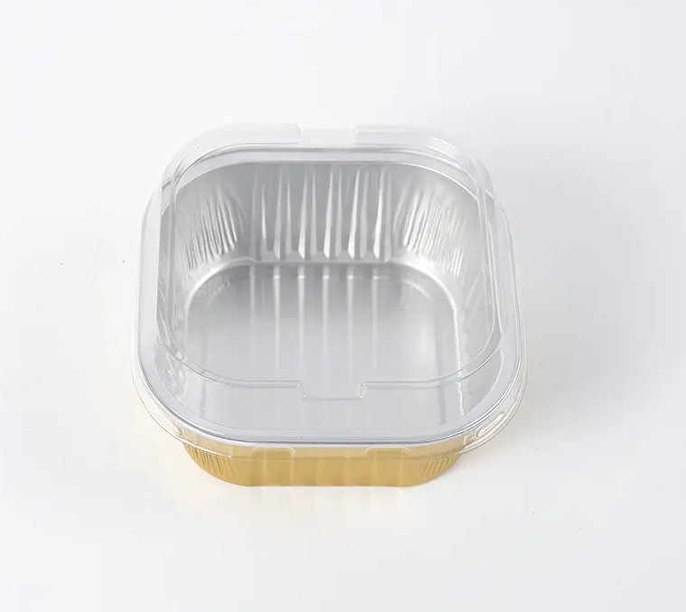 Elegant mat, hållbar förpackning: tjusningen med matbehållare av svart guld i aluminiumfolie